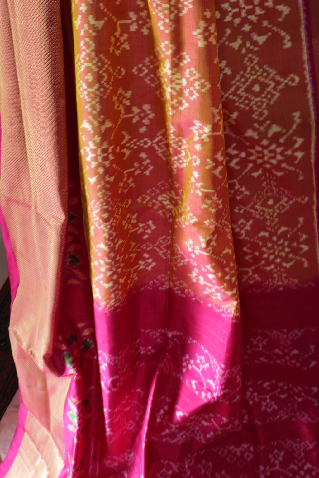 Pure Silk Pochampally Ikat Saree in Coral Orange with Bright Pink Contrast Border