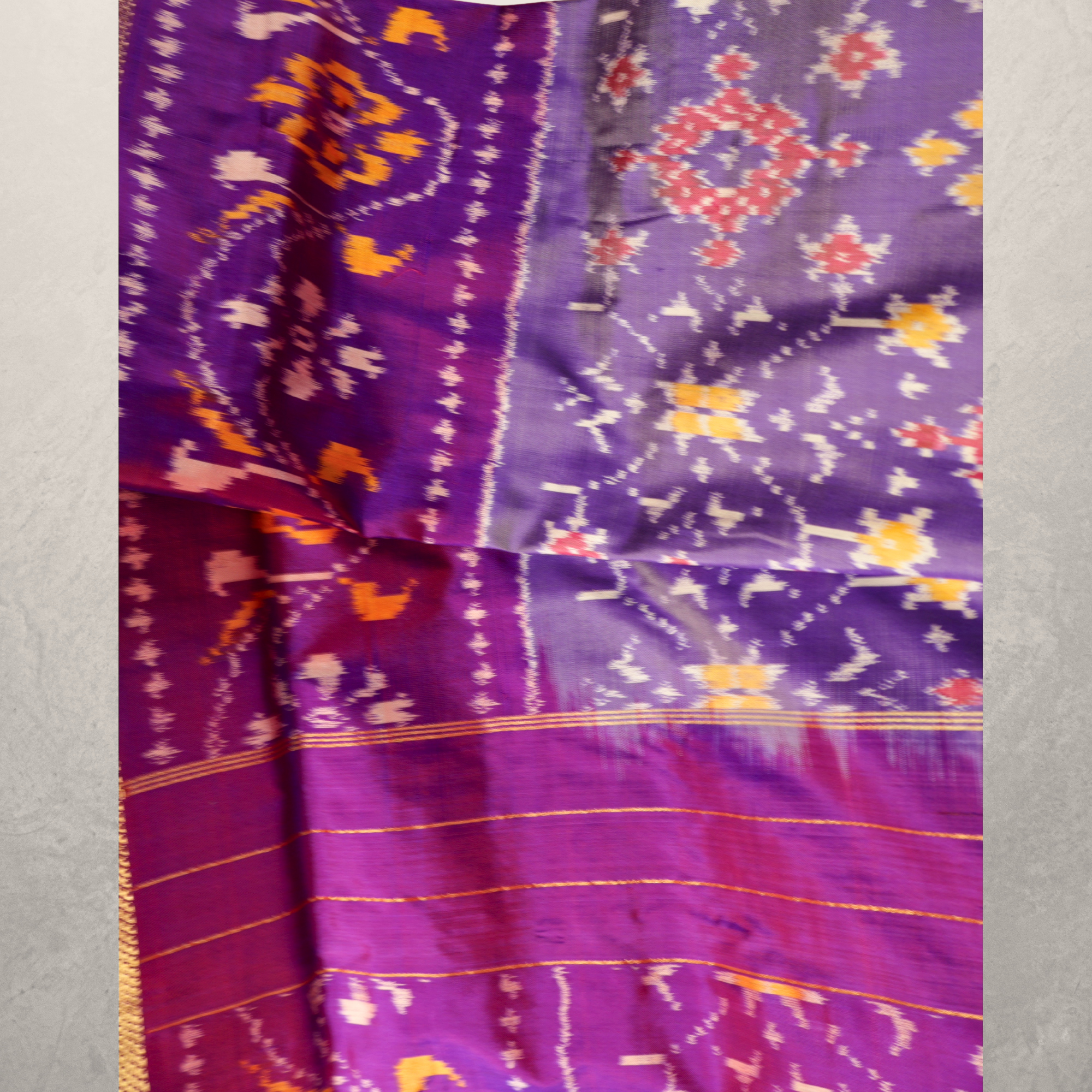 Pure Silk Pochampally Ikat Saree in Mauve with Purple Chatai Border