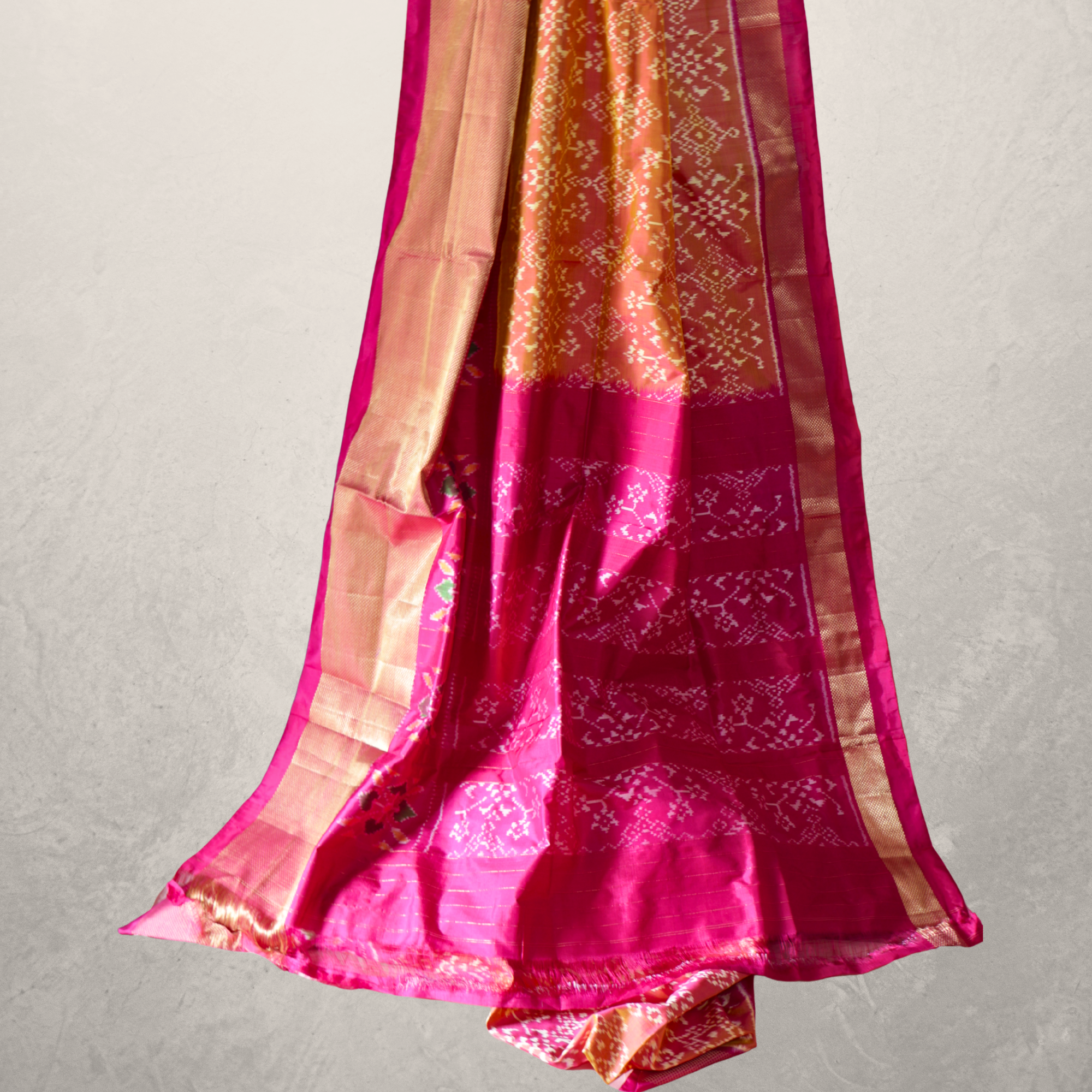 Pure Silk Pochampally Ikat Saree in Coral Orange with Bright Pink Contrast Border