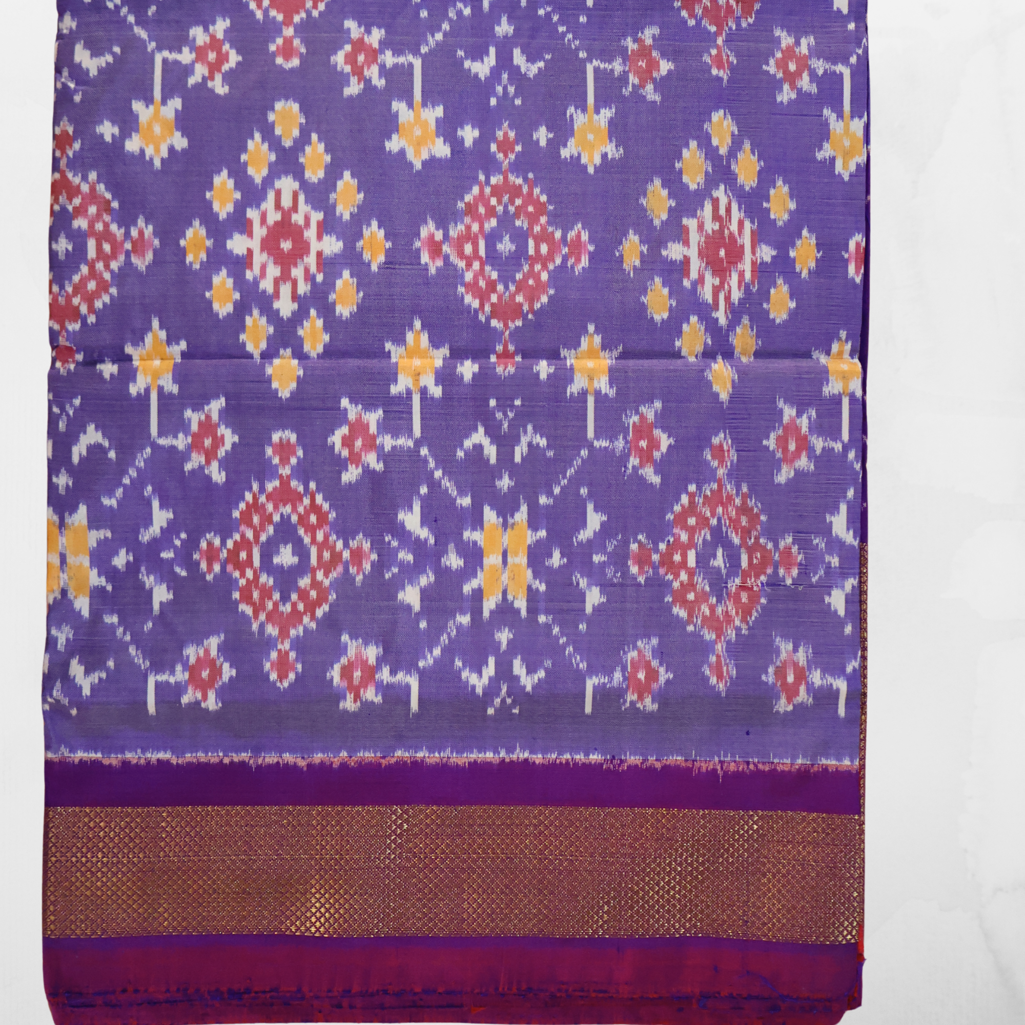 Pure Silk Pochampally Ikat Saree in Mauve with Purple Chatai Border