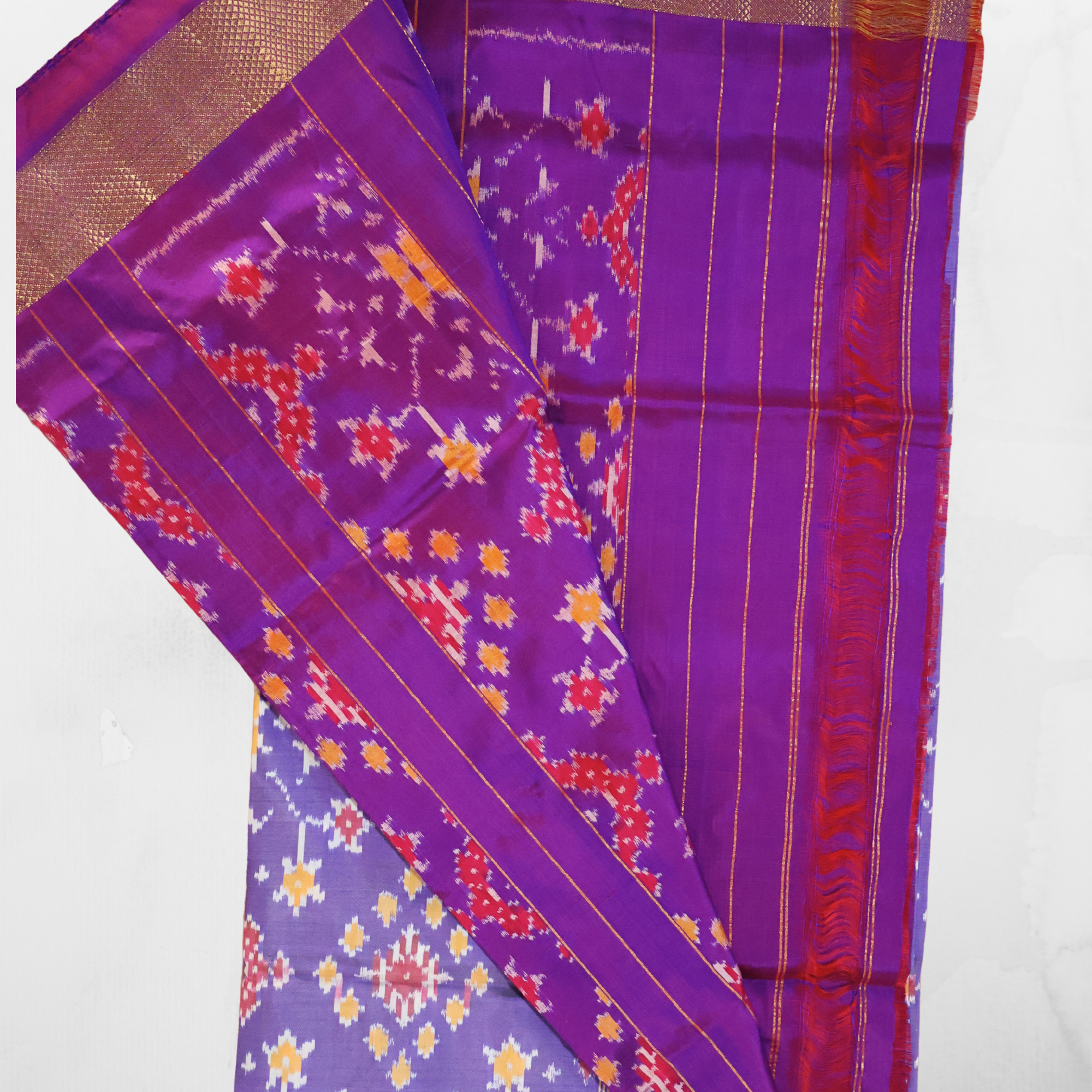 Pure Silk Pochampally Ikat Saree in Mauve with Purple Chatai Border