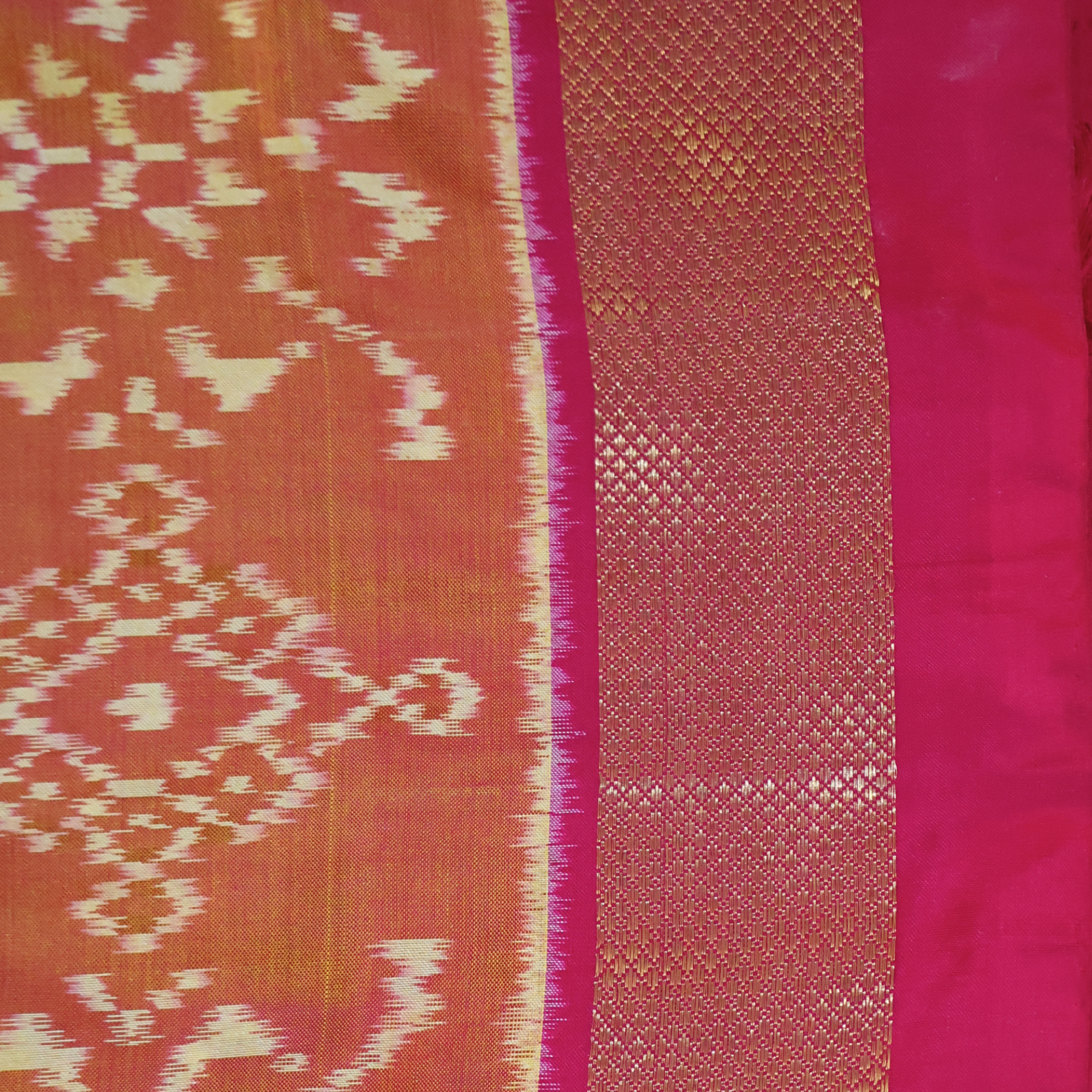 Pure Silk Pochampally Ikat Saree in Coral Orange with Bright Pink Contrast Border