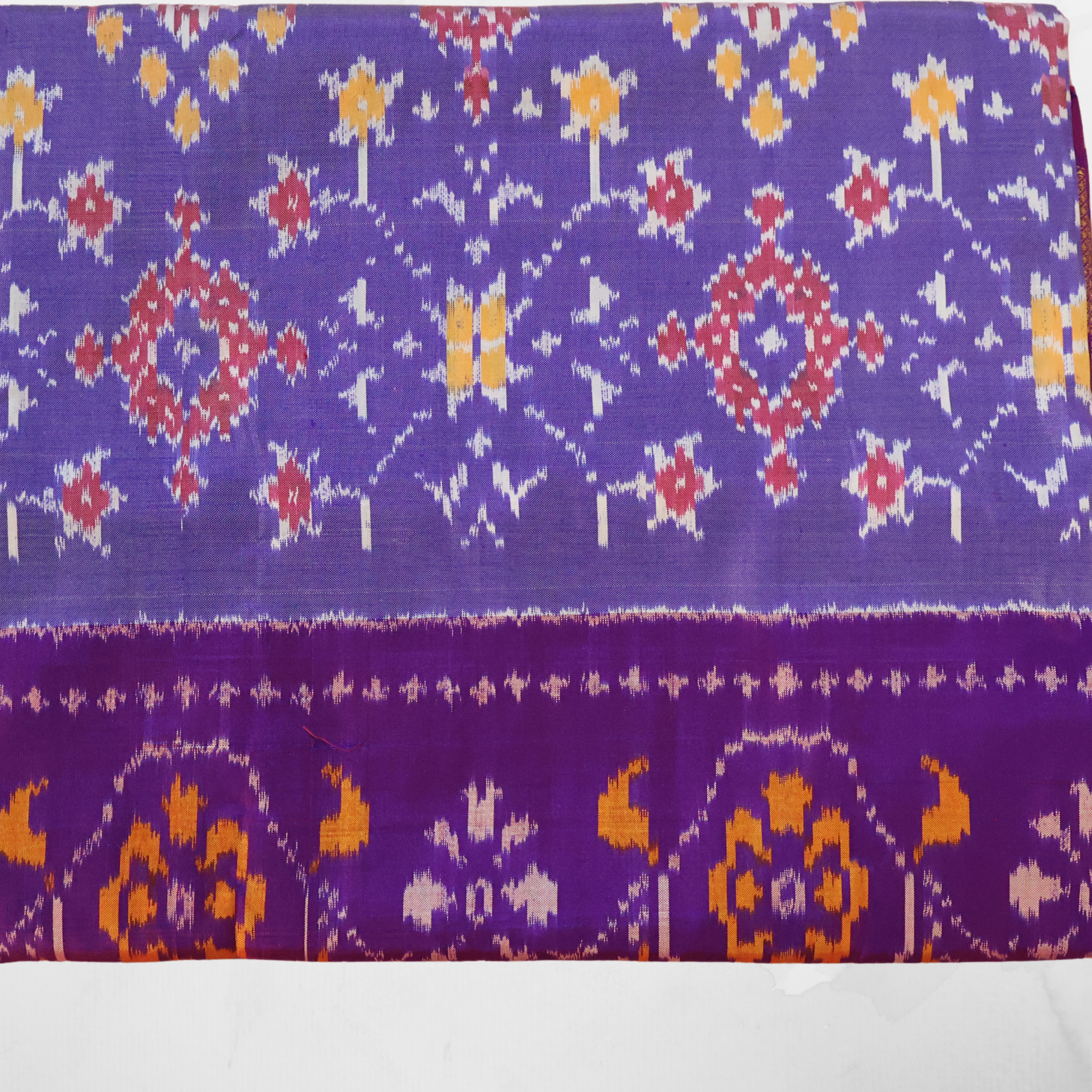 Pure Silk Pochampally Ikat Saree in Mauve with Purple Chatai Border