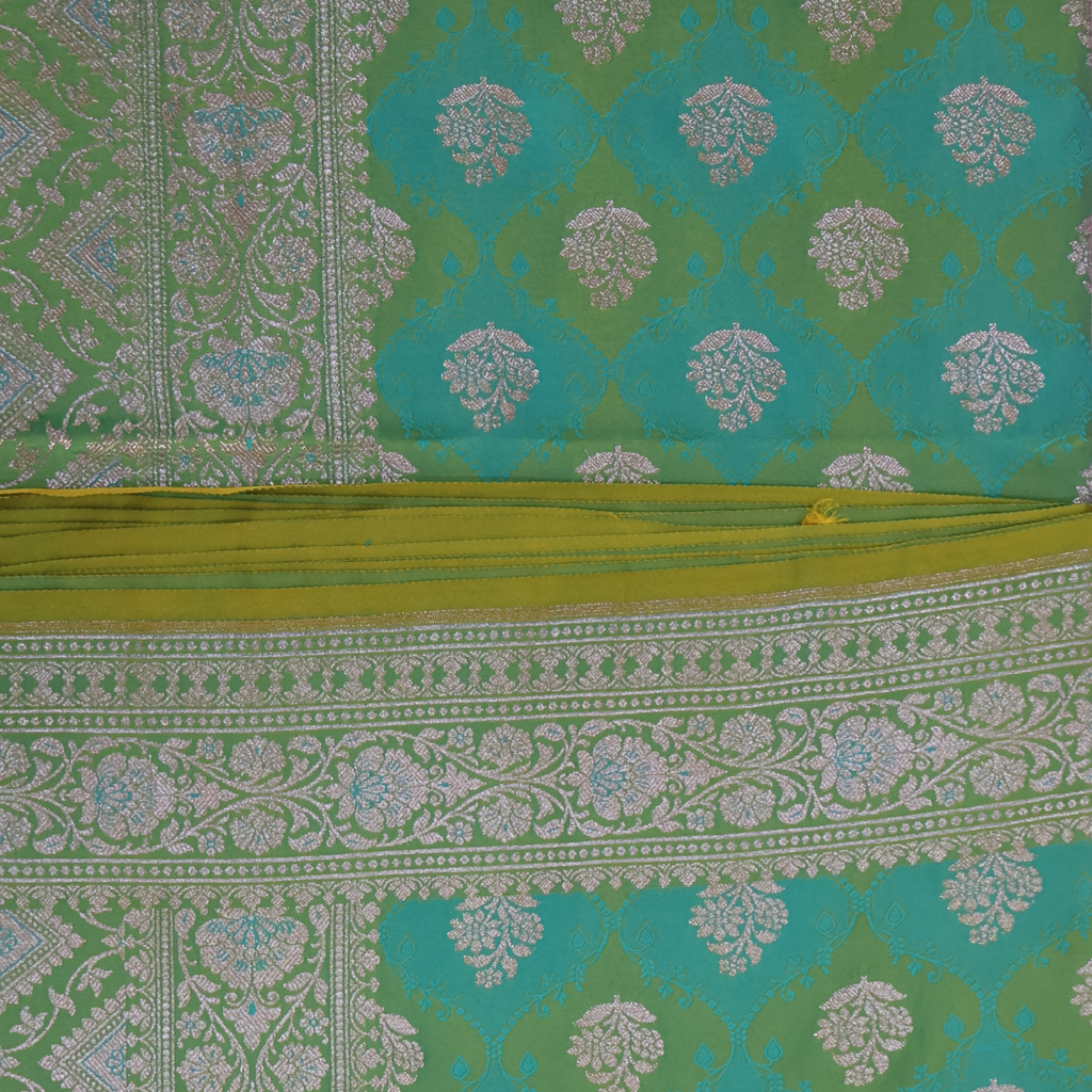 Katan Silk Banarasi Saree in Teal Green with Silver Zari Buta and Ornate Border
