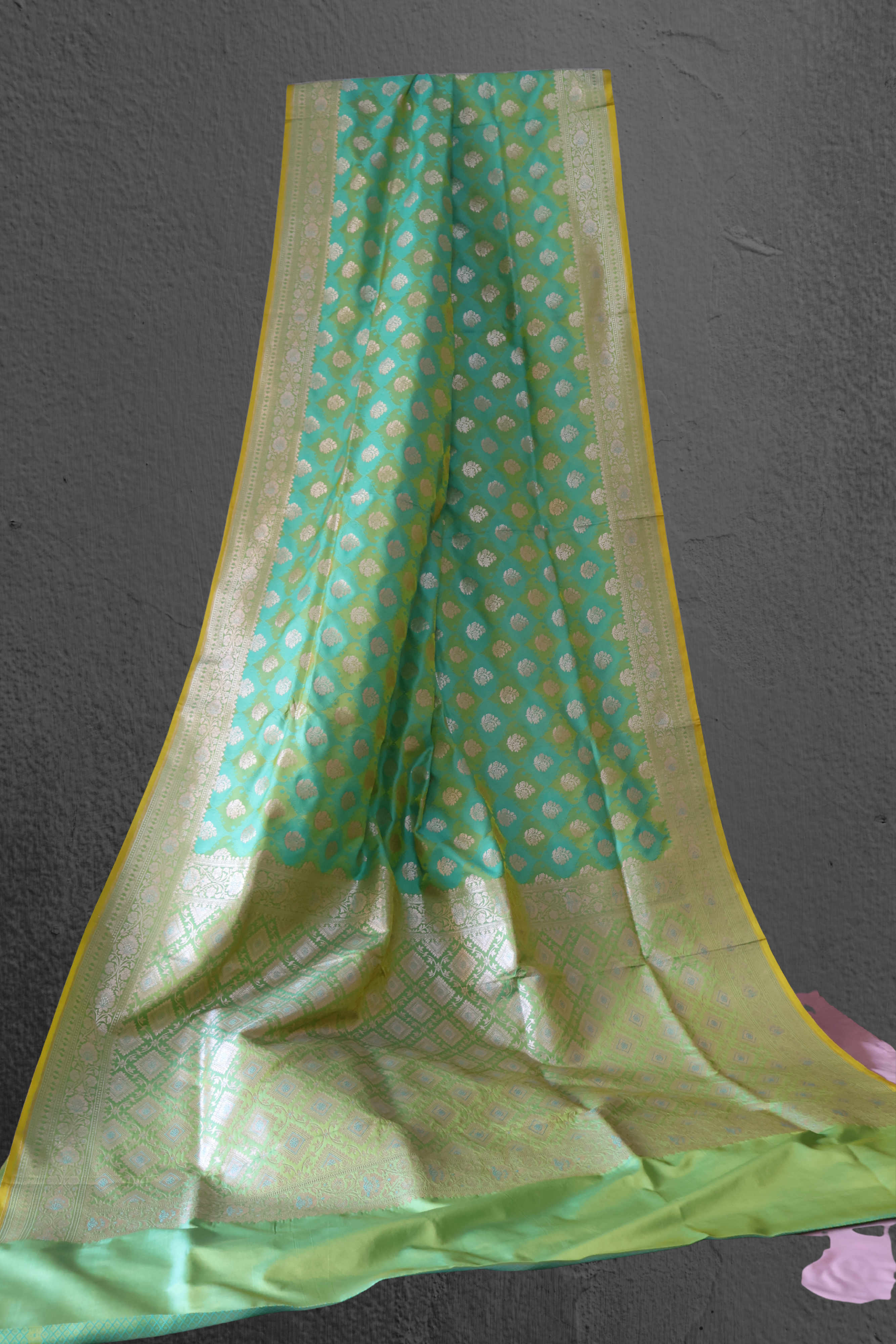 Katan Silk Banarasi Saree in Teal Green with Silver Zari Buta and Ornate Border